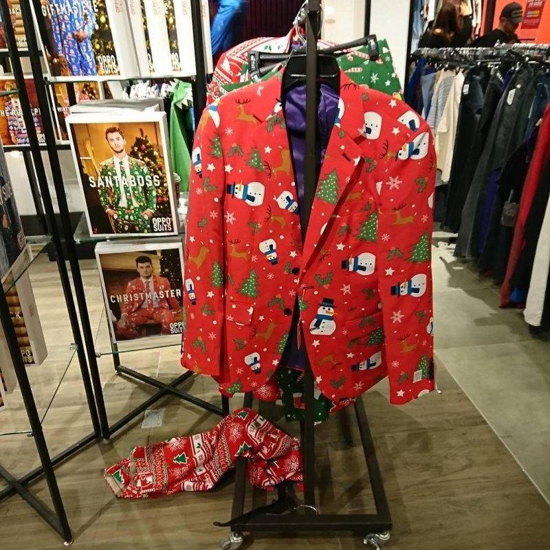 I see your ugly and raise you and ugly Christmas suit 